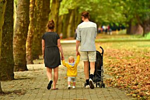 Family walking in park