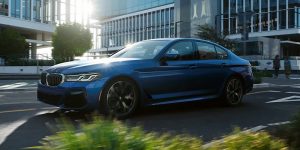 Front left angle view of Blue BMW 5 Series