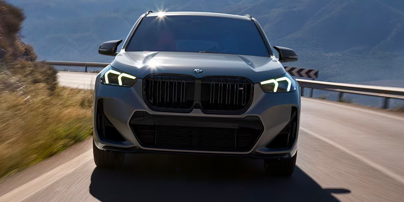 2025 BMW X1 driving on a highway