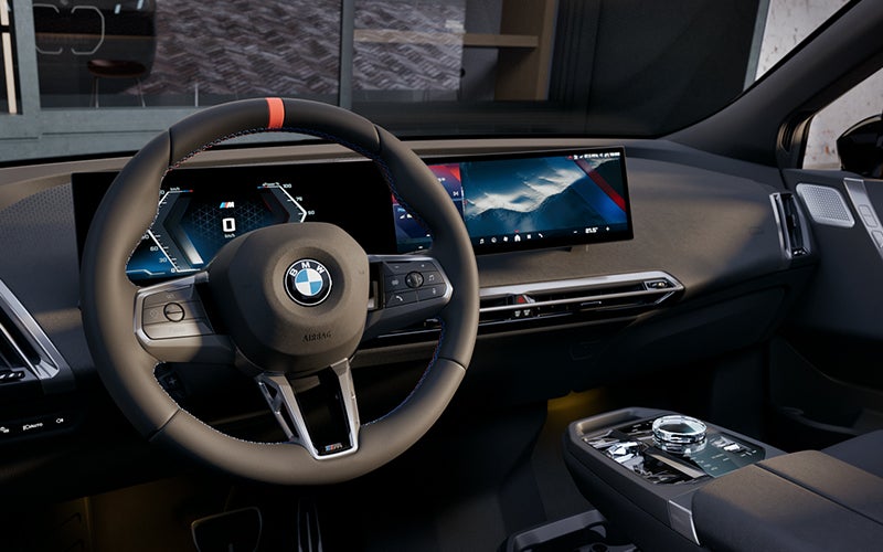 Interior steering wheel and dashboard of the BMW iX M70. | Tom Bush BMW Orange Park in Jacksonville FL